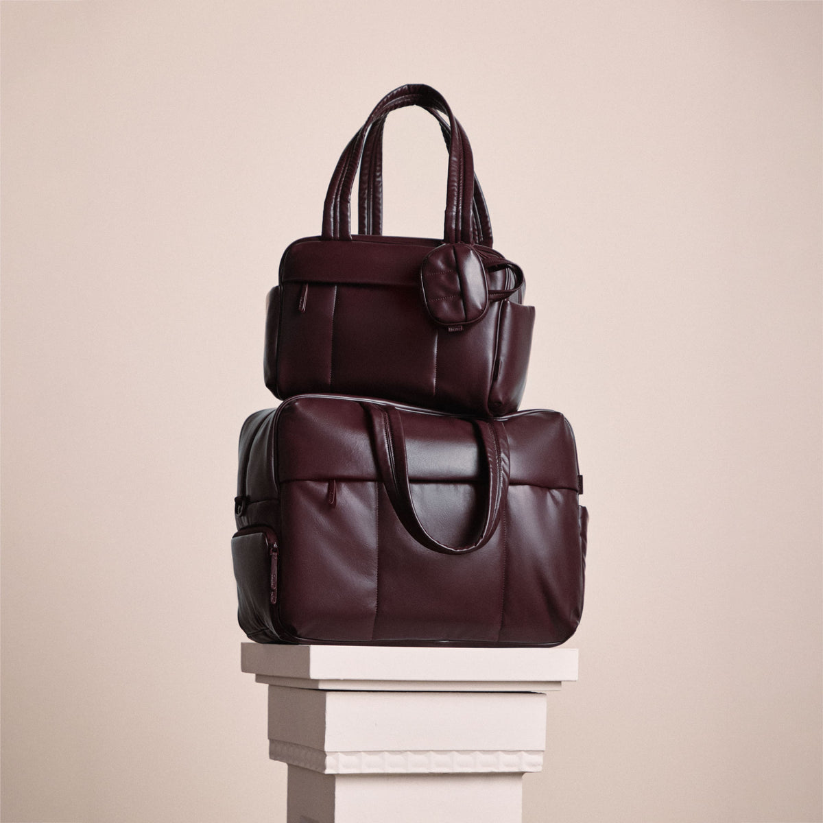 CALPAK Vegan Leather Luka Duffel and Mini Duffel in Dark Cherry