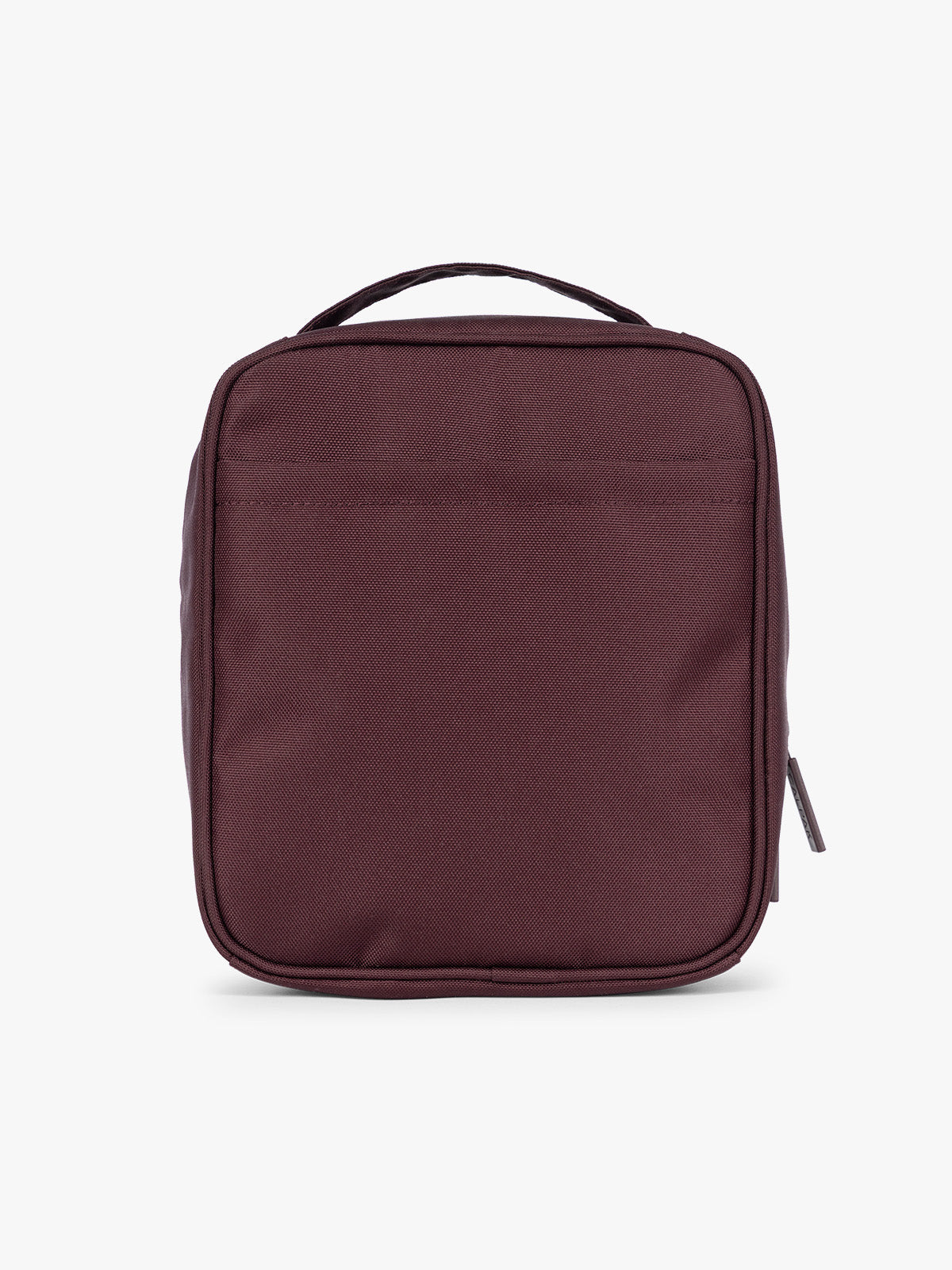 Backside of the dark burgundy Dark Cherry color of the CALPAK Everything Cube organizer with a top handle, a front zippered pocket, and a textured mesh lower panel, shown against a plain white background; ACE2401-DARK-CHERRY
