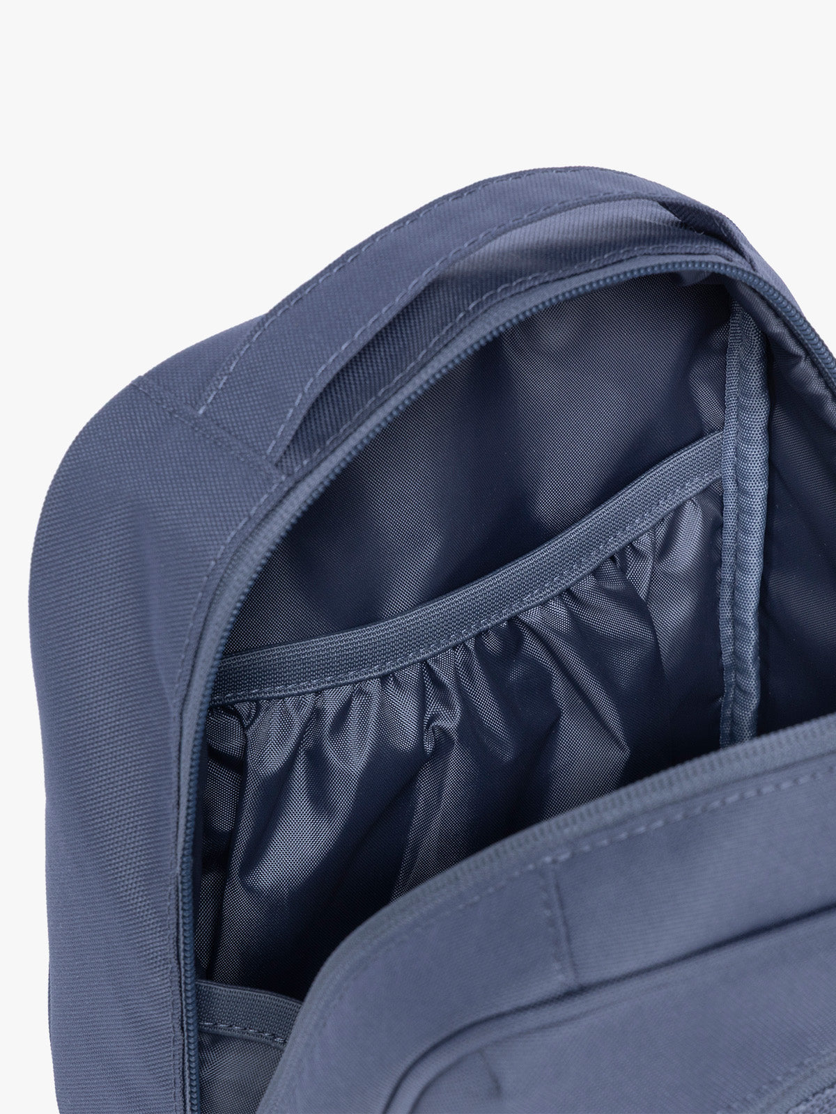 Inside pocket of CALPAK Everything Cube in dark blue Indigo ; ACE2401-INDIGO
