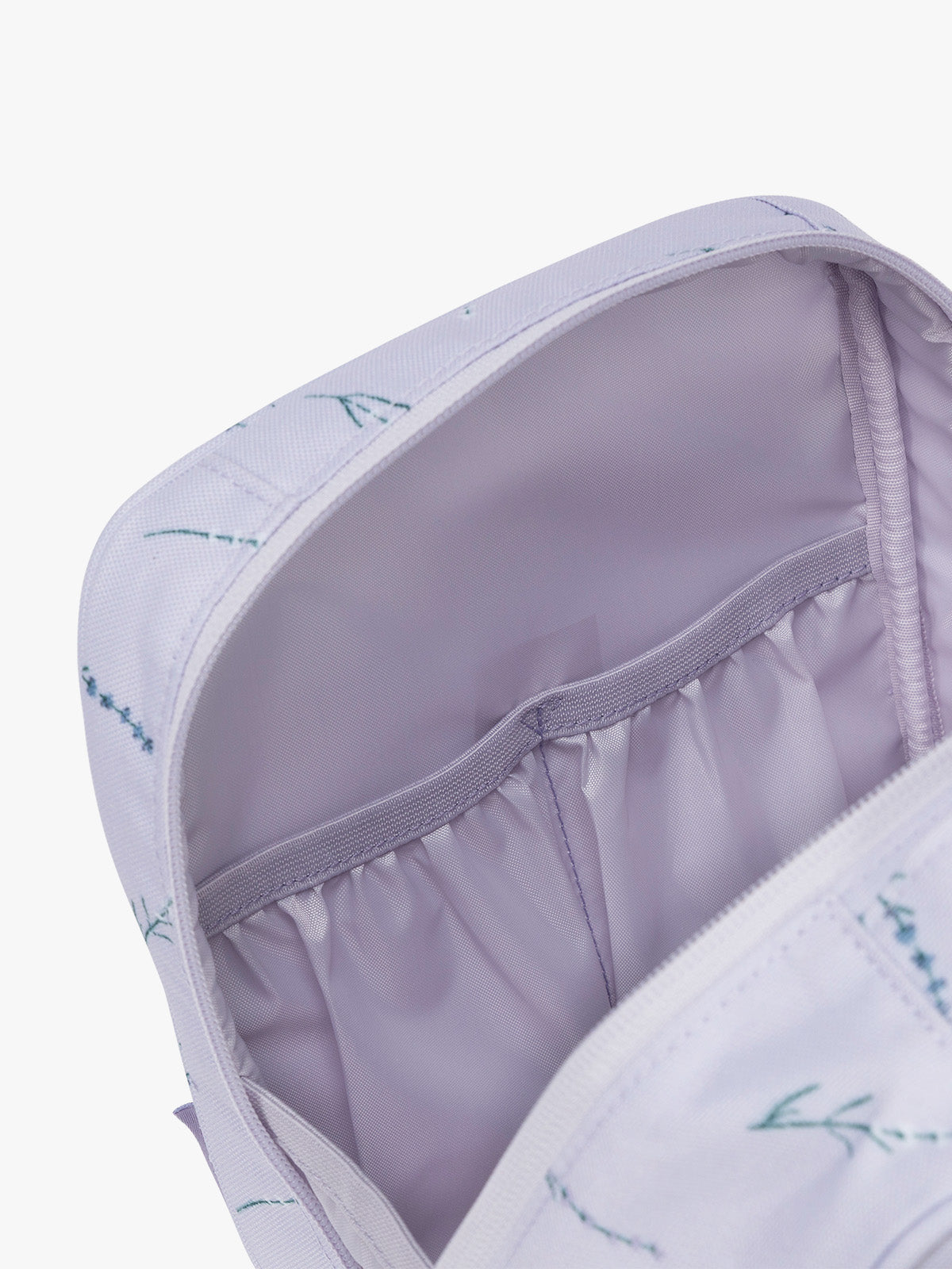 Inside pockets of CALPAK Everything Cube in light purple with lavender flower print ; ACE2401-LAVENDER-BLOOM