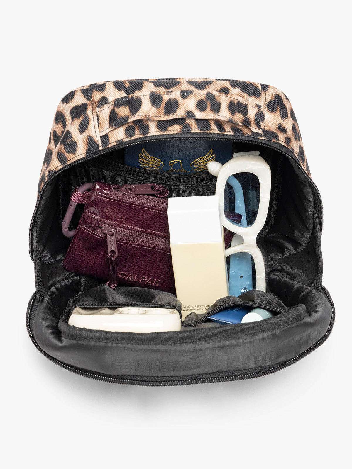 Inside of the Leopard print in Leopard the CALPAK Everything Cube organizer with a top handle, a front zippered pocket, and a textured mesh lower panel, shown against a plain white background; ACE2401-LEOPARD