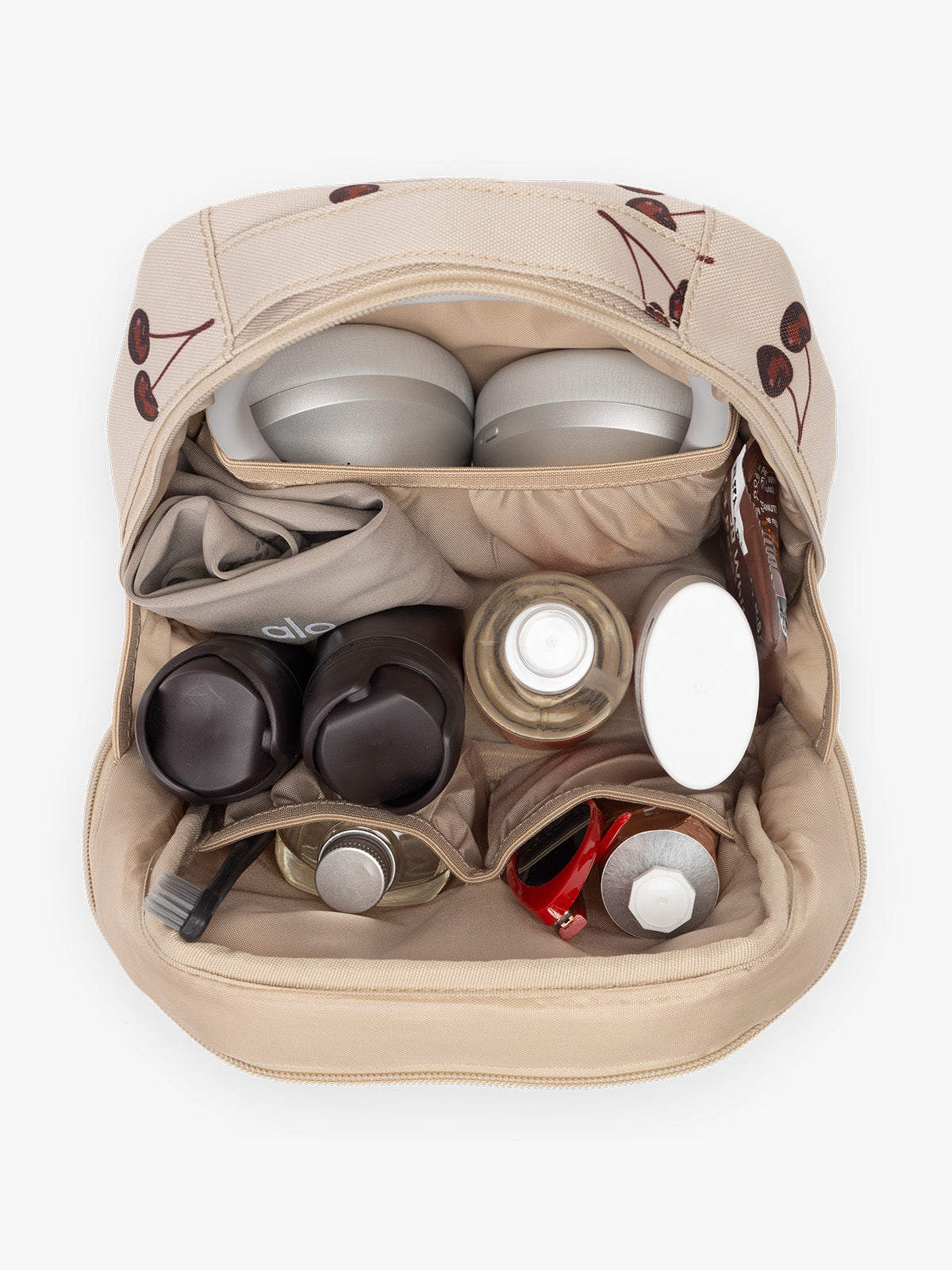Opened view with items inside CALPAK Everything Cube beige with cherry print Oatmeal Pink; ACE2401-OATMEAL-CHERRY