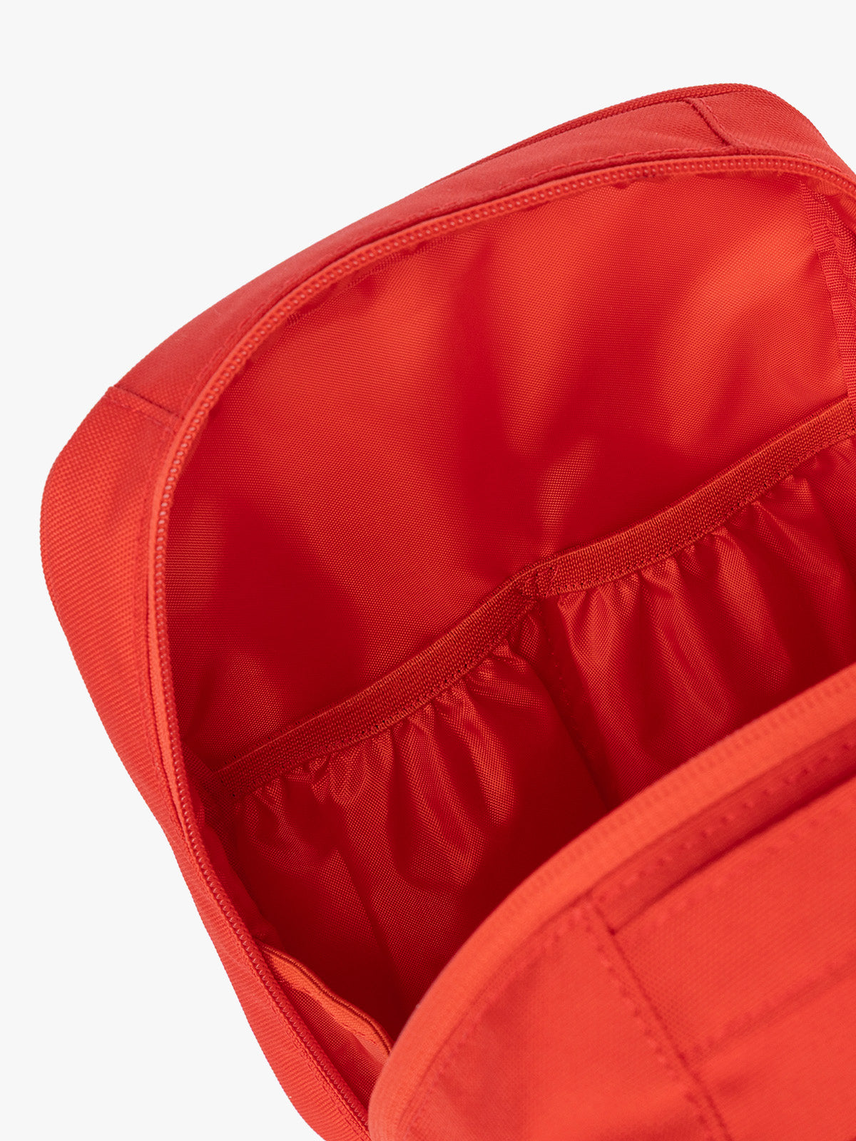 Pockets of CALPAK Everything Cube in red Tomato; ACE2401-TOMATO