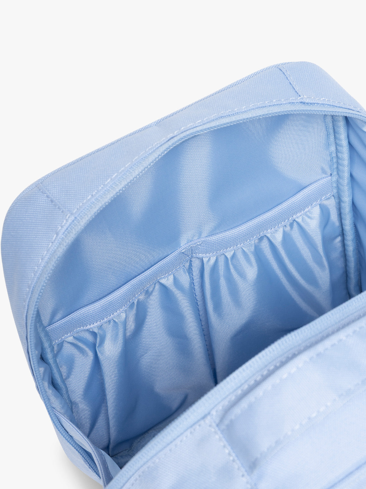Inside of CALPAK Everything Cube in light blue SKY; ACE2401-SKY