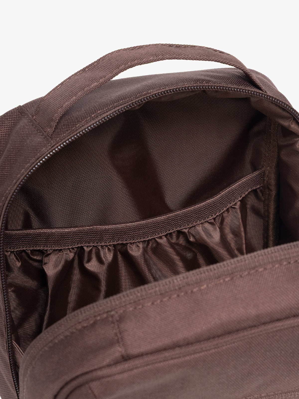 Interior pocket of CALPAK Everything Cube in brown Walnut; ACE2401-WALNUT
