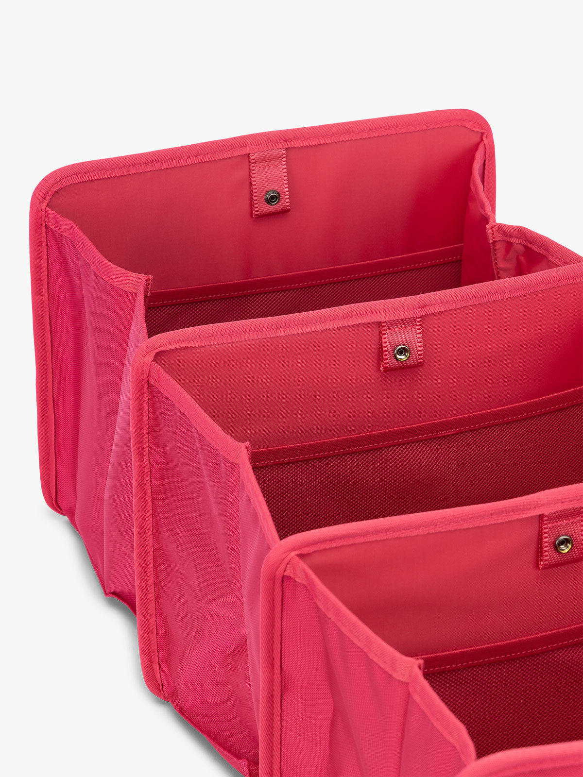 CALPAK collapsible car trunk organizer featuring compartments in pink dragonfruit; ACO2001-DRAGONFRUIT