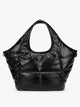 Black quilted puffer CALPAK Luka Everything Tote Bag with a smooth finish and double shoulder straps, shown against a plain white background; AET2601-BLACK-PU