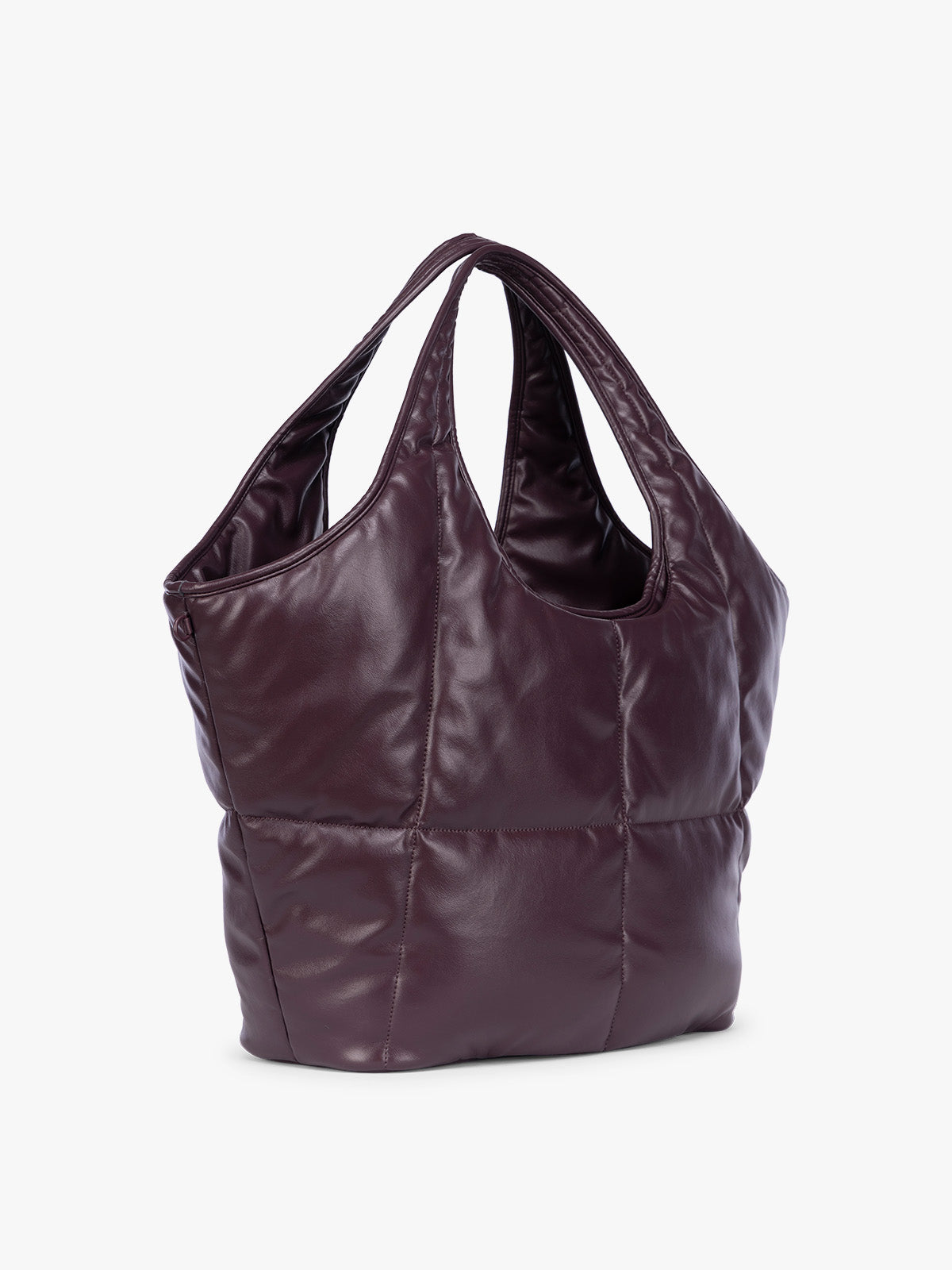 Side view of a Dark Cherry quilted puffer CALPAK Luka Everything Tote Bag with a smooth finish and double shoulder straps, shown against a plain white background; AET2601-DARK-CHERRY-PU