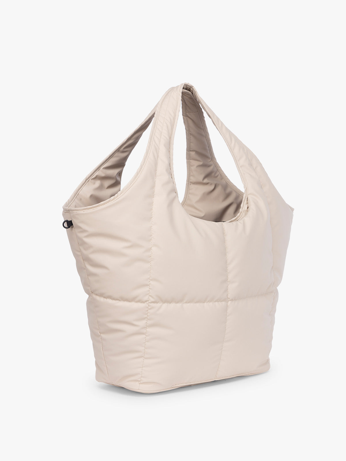 Side view of CALPAK Luka Everything Tote in off-white beige Oatmeal; AET2601-OATMEAL