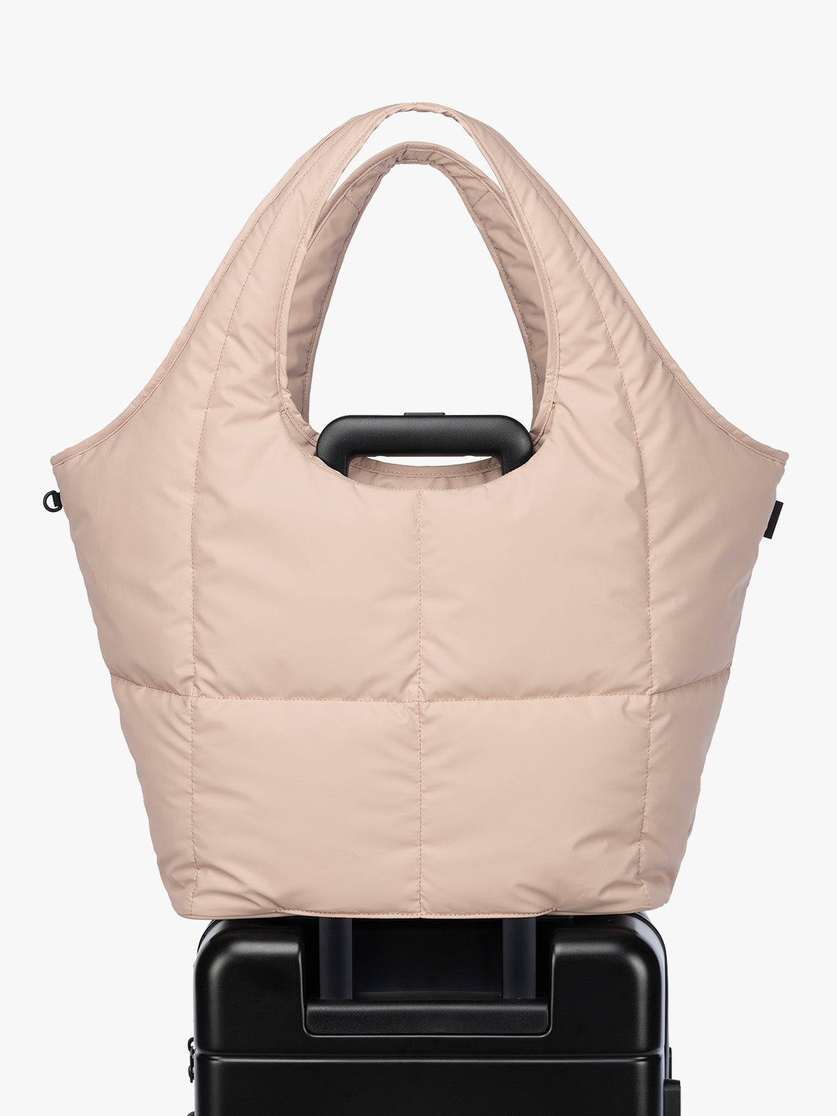 Luggage trolley sleeve of CALPAK Luka Everything Tote in light pink Rose Quartz; AET2601-ROSE-QUARTZ