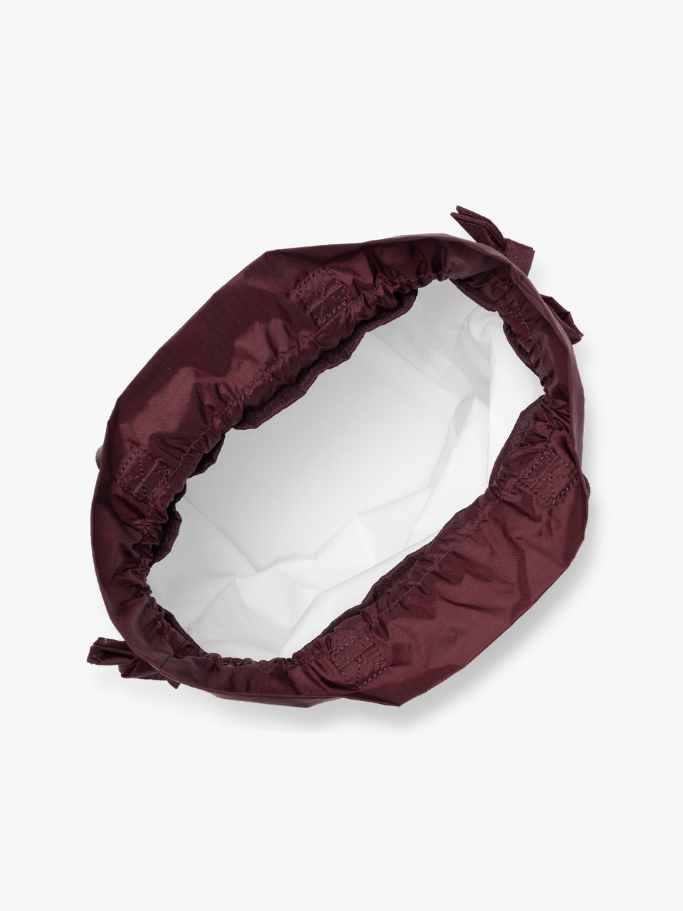 Opened burgundy Dark Cherry CALPAK Insulated Lunch Bag with top handles, featuring a white interior lining shown against a plain white background; ALB2001-DARK-CHERRY