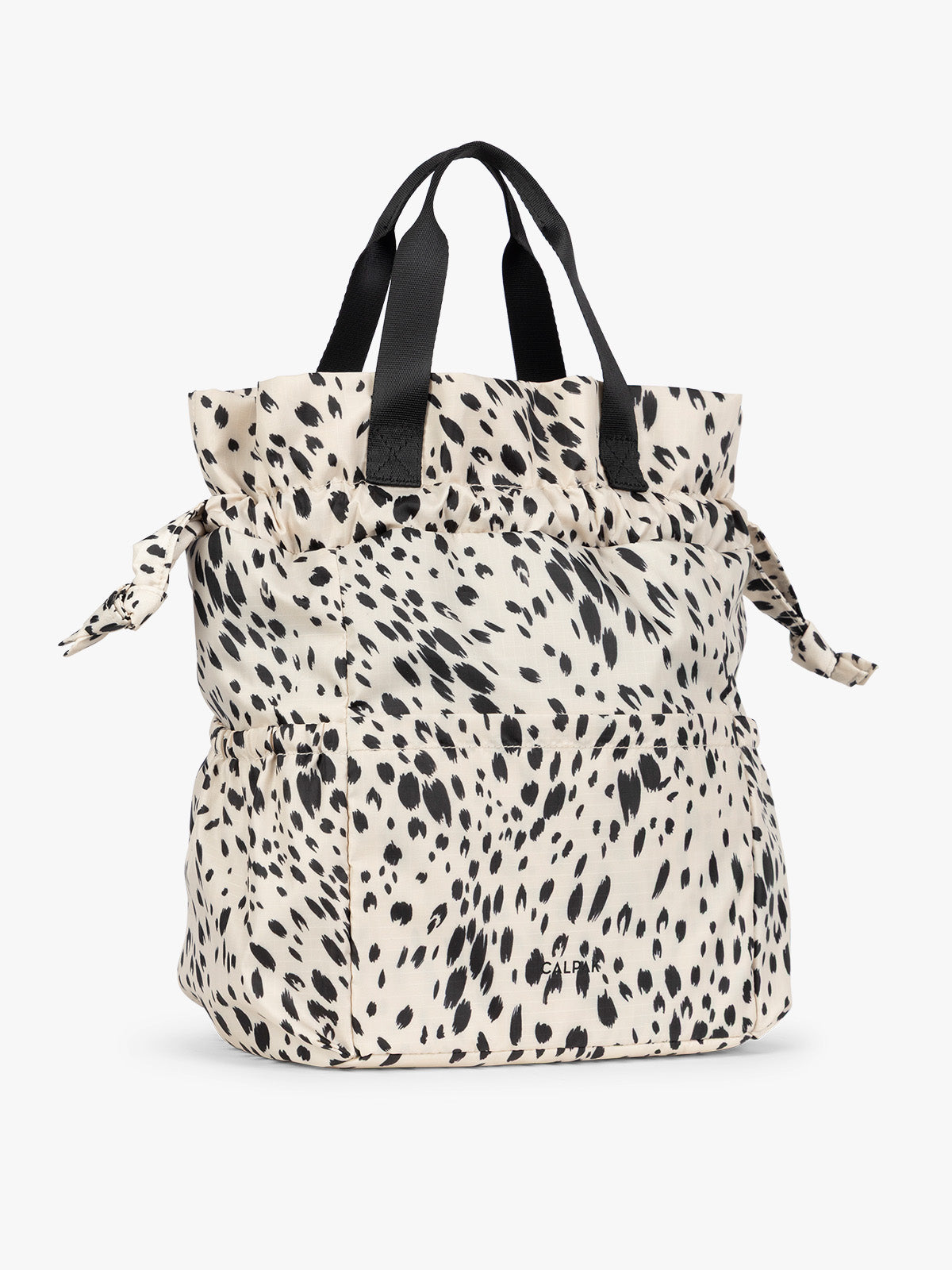 White and black Snow Leopard print CALPAK Insulated Lunch Bag with top handles, featuring an expandable function shown against a plain white background; ALB2001-SNOW-LEOPARD