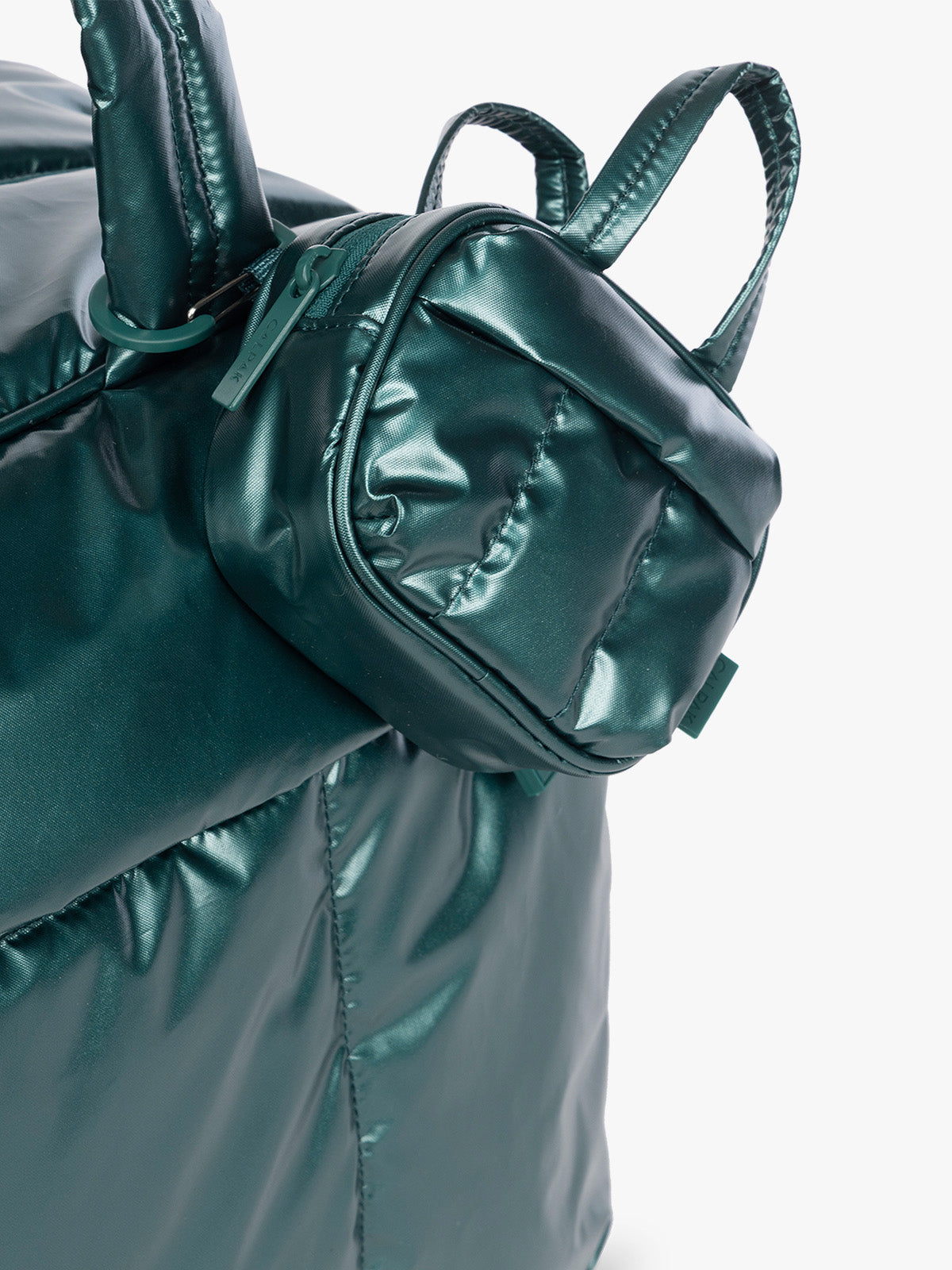 CALPAK Luka Duffel Zip Bag Charm in dark green shiny Glazed Kale clipped on bag ; ALK2501-GLAZED-KALE