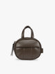 A dark brown Mushroom vegan leather top-handle CALPAK Luka Zip Bag Charm with a zippered front pocket and a small side strap, shown against a plain white background; ALK2501-MUSHROOM-PU