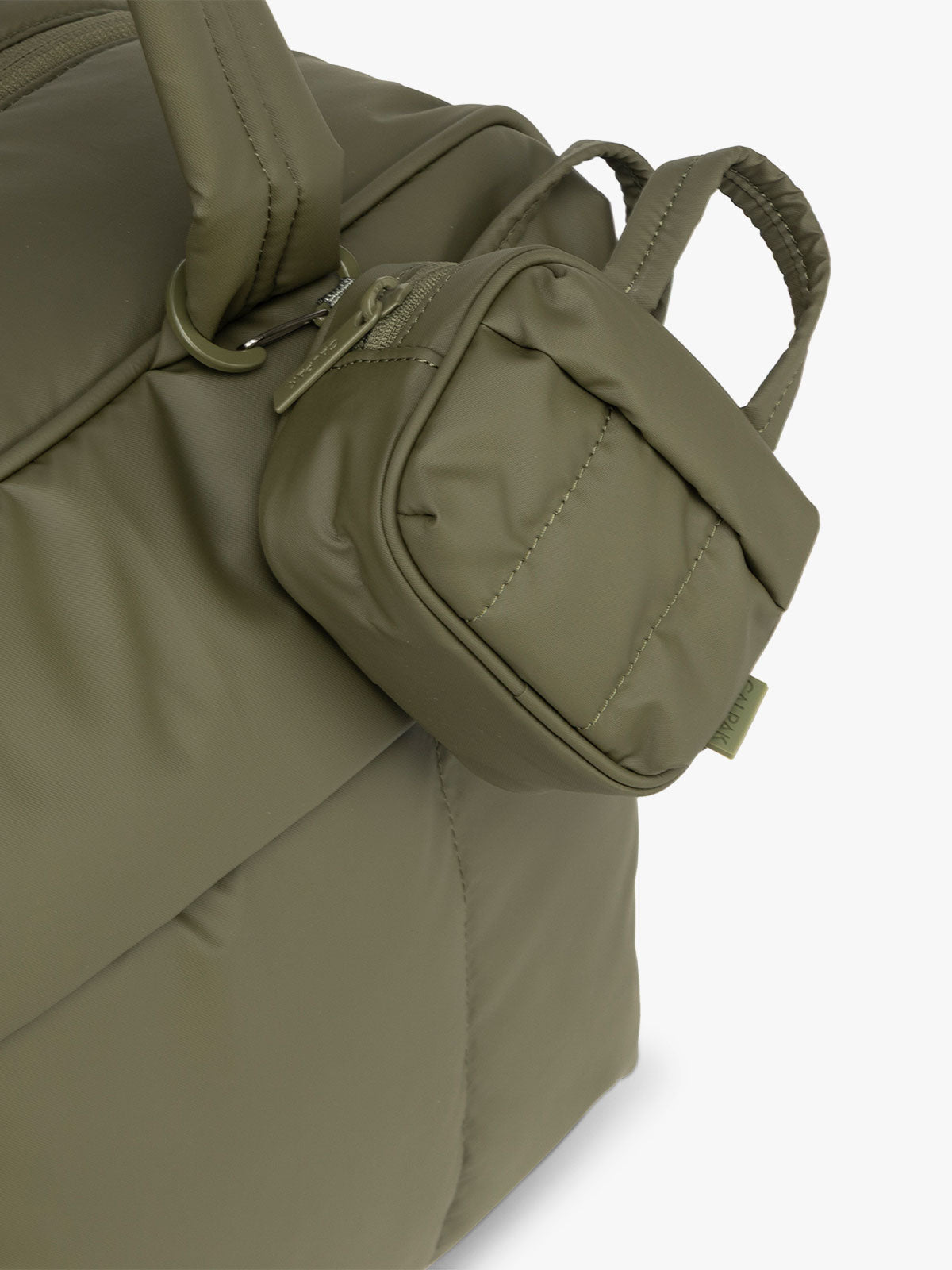 Luka Duffel Key Pouch in dark green Pine clipped on bag; ALK2501-PINE