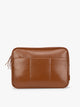 Light Honey Brown vegan leather CALPAK Luka 14in Laptop Sleeve with a zippered top and a front pocket, shown against a plain white background; ALL2401-HONEY-BROWN-PU