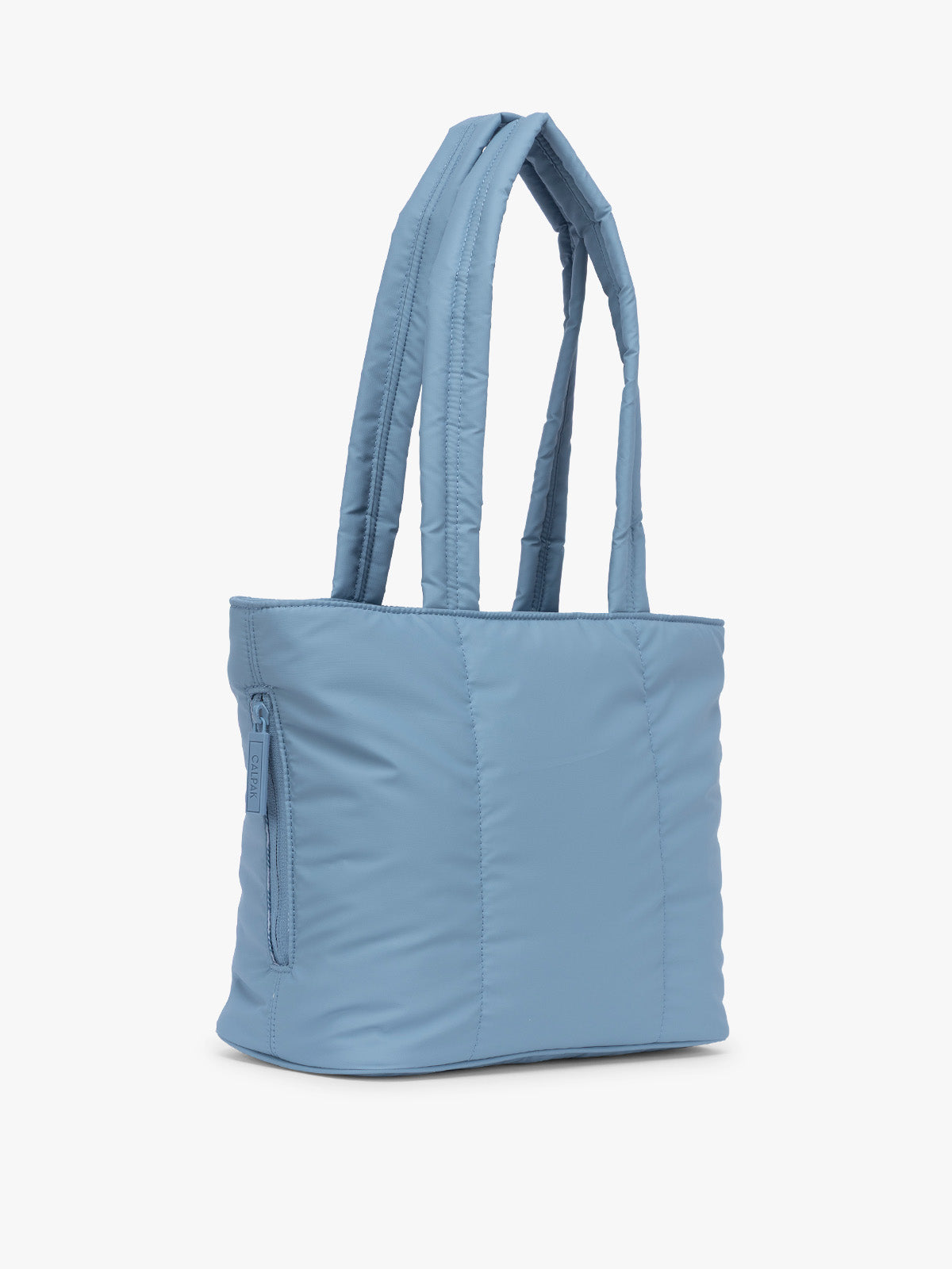 Side view of CALPAK Luka Mini Tote in light blue French Blue; ALM2401-FRENCH-BLUE
