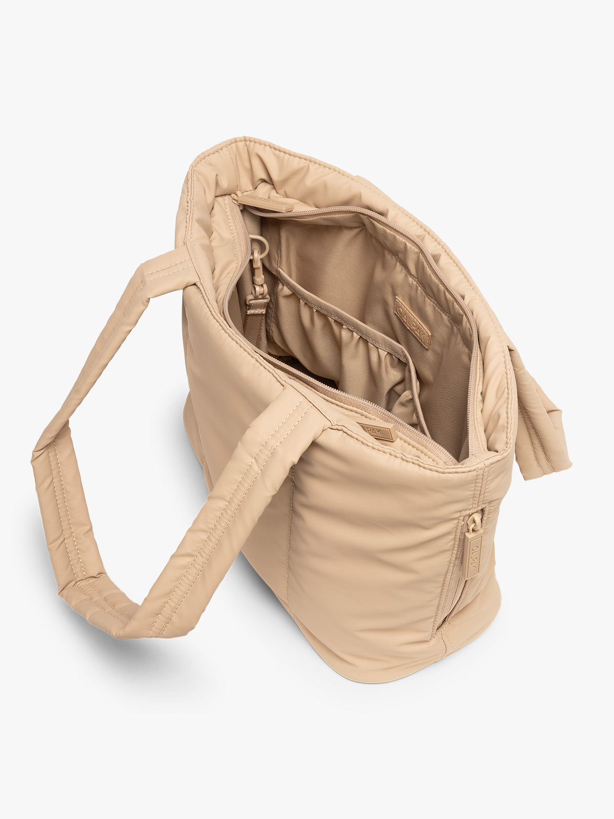 Opened view of CALPAK Luka Mini Tote in beige Latte on a white background; ALM2401-LATTE
