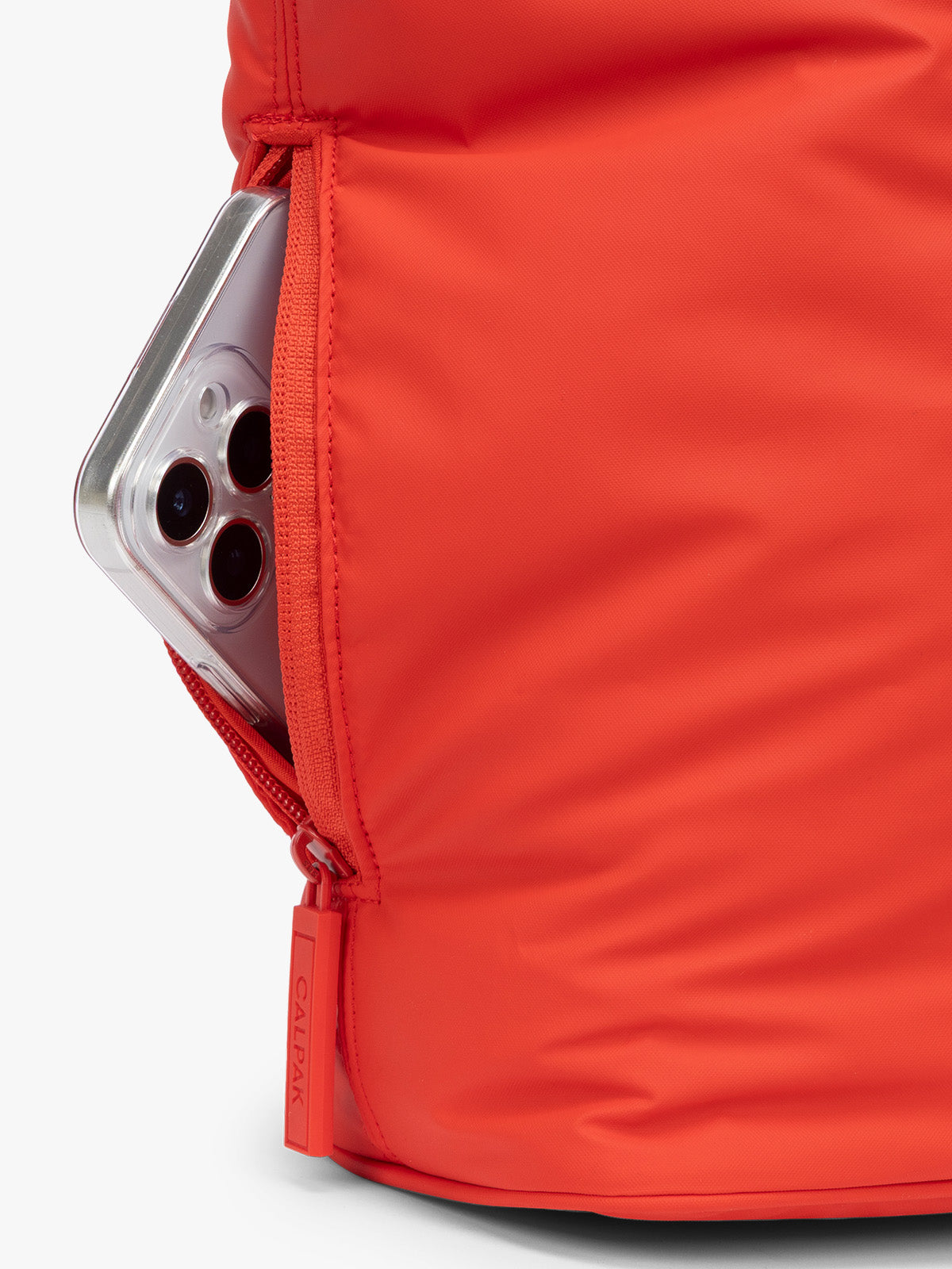 Side view of CALPAK Luka Mini Tote in red Tomato; ALM2401-TOMATO