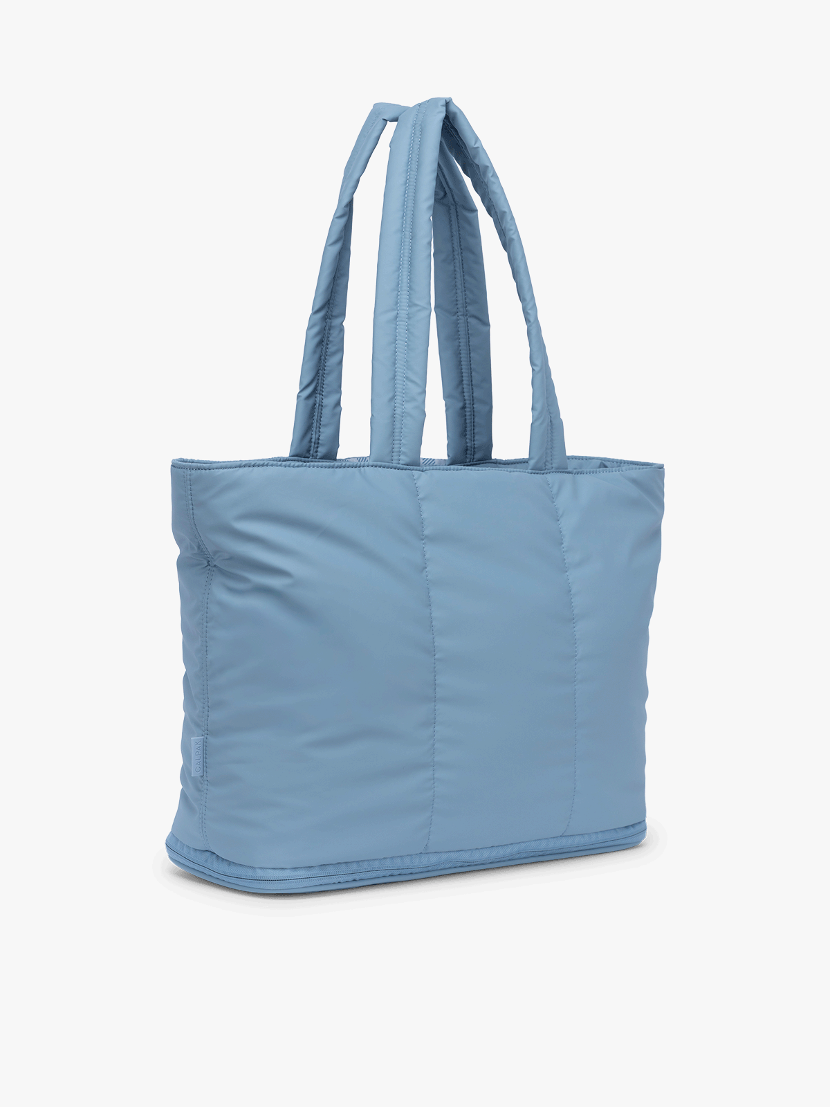 Gif of expandable feature of the CALPAK Luka Expandable Tote in light blue French Blue; ALT2201-FRENCH-BLUE
