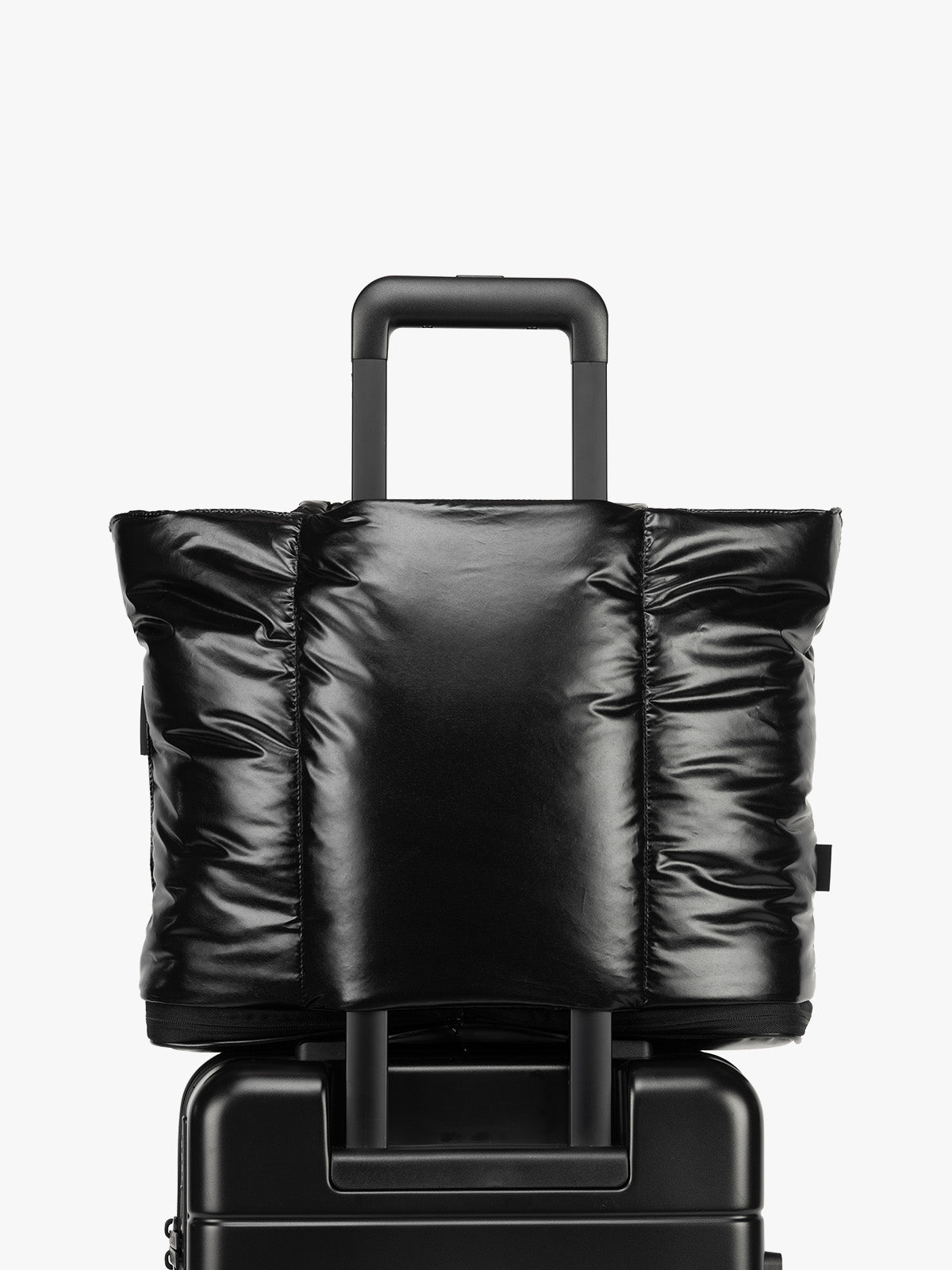 Trolley sleeve of CALPAK Luka Expandable Tote in Glazed Black; ALT2201-GLAZED-BLACK