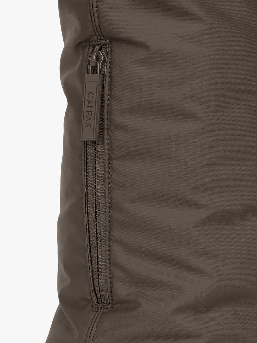Side pocket of CALPAK Luka Expandable Tote in brown Mushroom; ALT2201-MUSHROOM