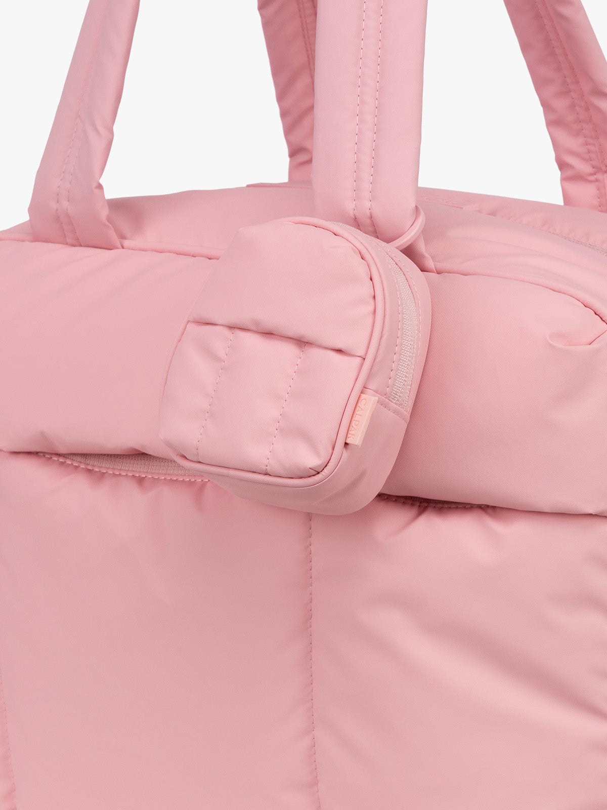 CALPAK Luka Backpack Key Pouch in pink monochrome Blossom attached to Luka Duffel Bag; AMB2201-BLOSSOM
