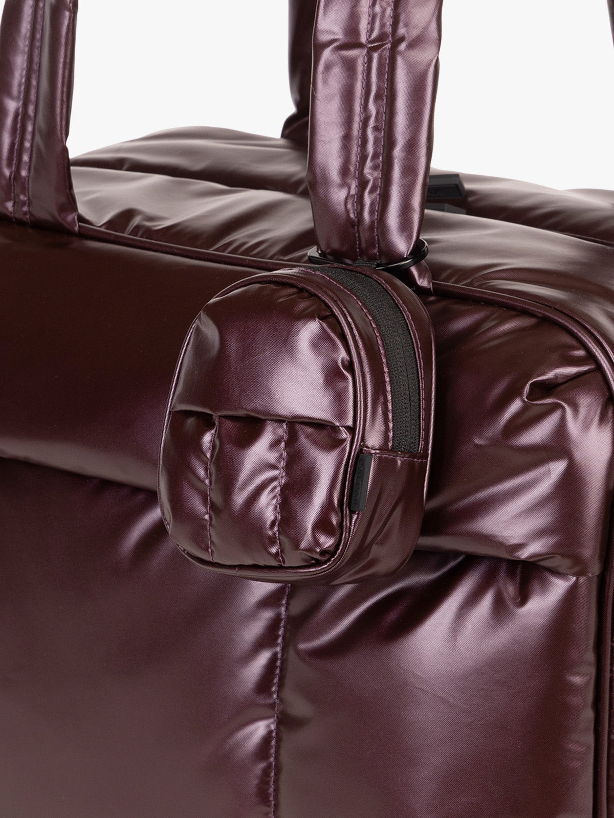 CALPAK Luka Backpack Key Pouch in maroon Glazed Dark Cherry clipped onto bag; AMB2201-GLAZED-DARK-CHERRY