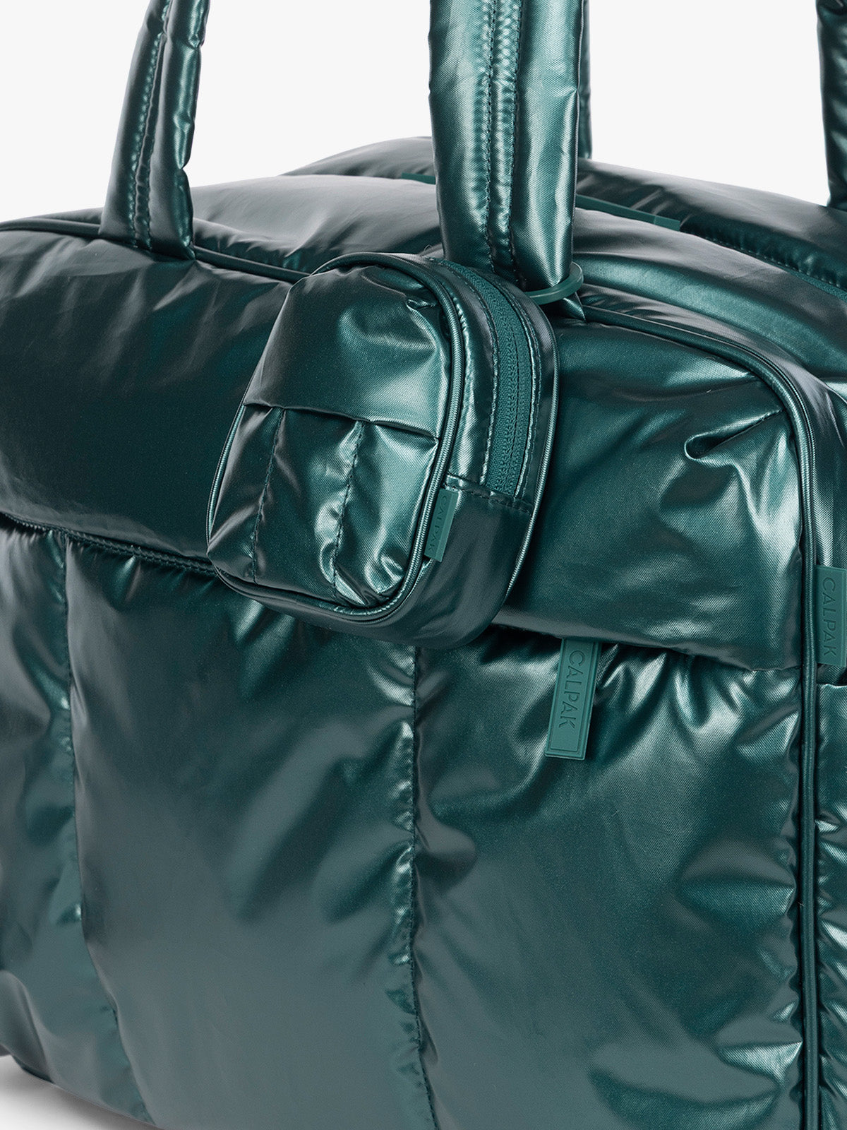 CALPAK Luka Backpack Zip Bag Charm in dark green KALE hanging on a bag; AMB2201-GLAZED-KALE