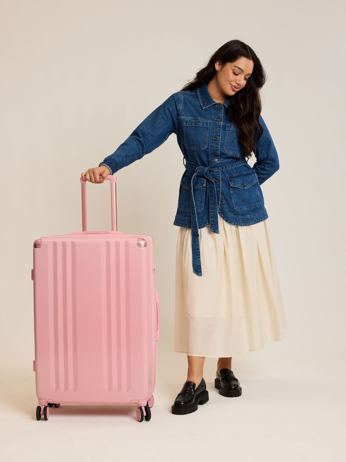 Model with CALPAK Ambeur Large Luggage in light pink Blossom; LAM1028-BLOSSOM