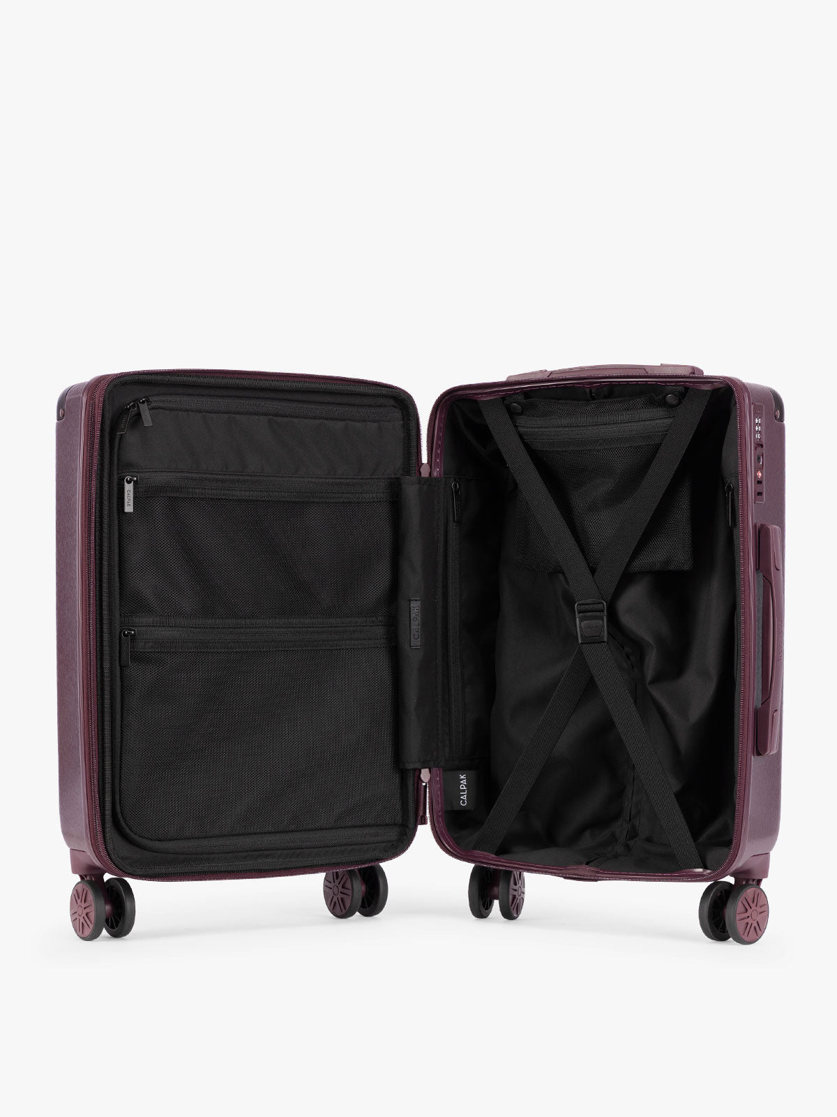 Opened view of CALPAK Two-Piece Set in dark burgundy Dark Cherry which includes the Carry On and Large sizes with vertical ridges, shown on a clean white background; LAM2000-DARK-CHERRY