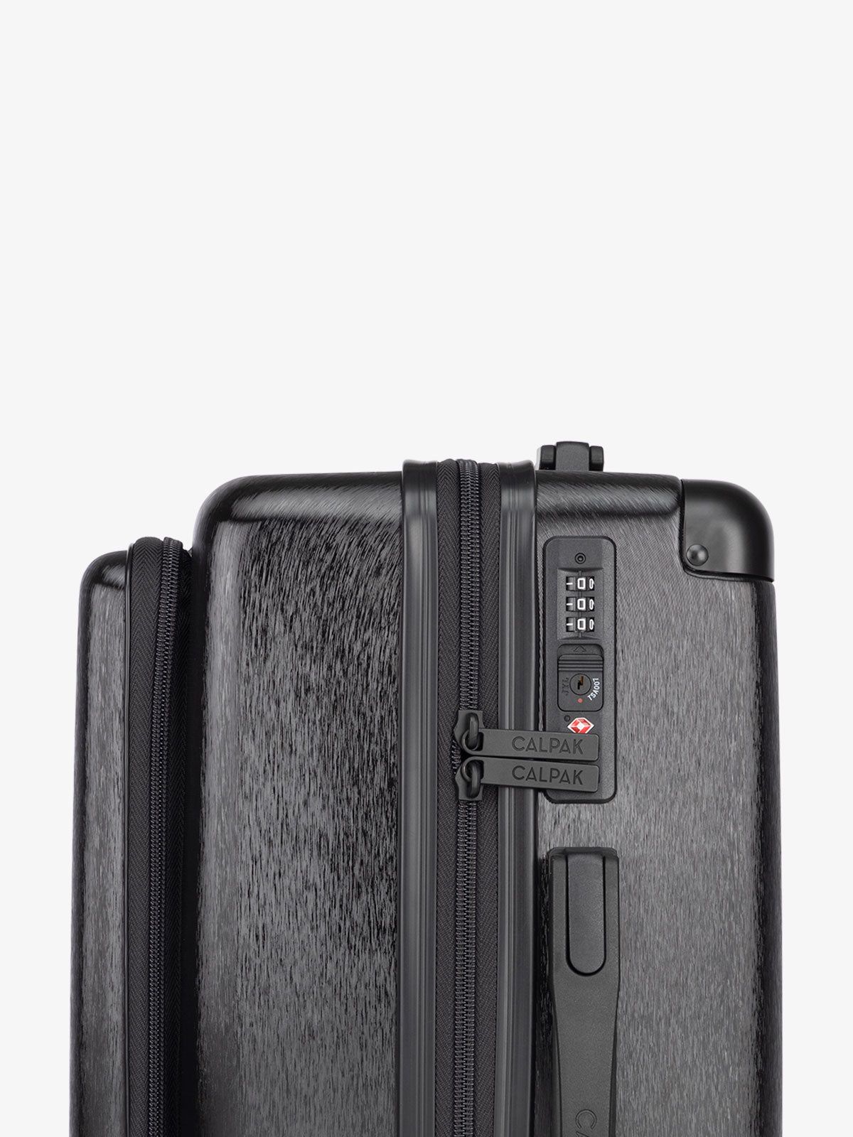 CALPAK Ambuer hardside 21 inch carry-on with front pocket and TSA lock in black; LAM1020-FP-BLACK