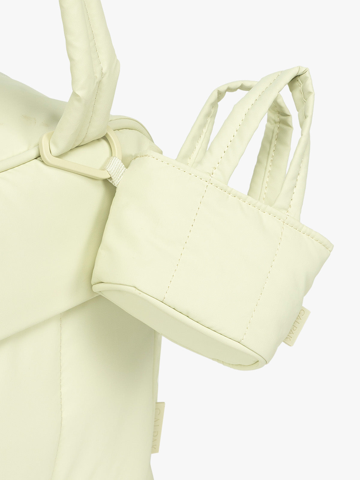 CALPAK Luka Tote Zip Bag Charm in light green Celadon with carabiner attached to bag; AMT2601-CELADON