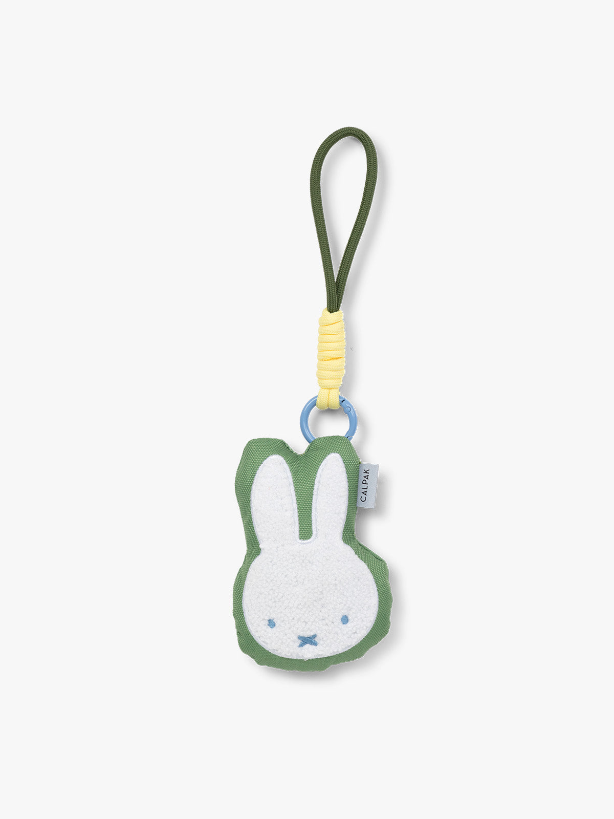 Plush Miffy x CALPAK Pluffy Bag Charm keychain with a green border and Miffy on a white background; APLF2501-GREEN-MIFFY