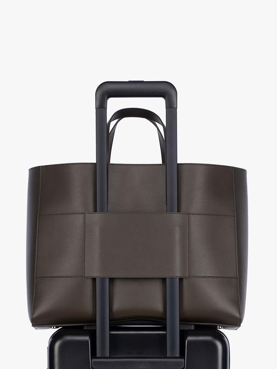 Trolley sleeve of Open gif of CALPAK Haven 16" Laptop Tote in dark brown Mushroom; ATO2102-MUSHROOM