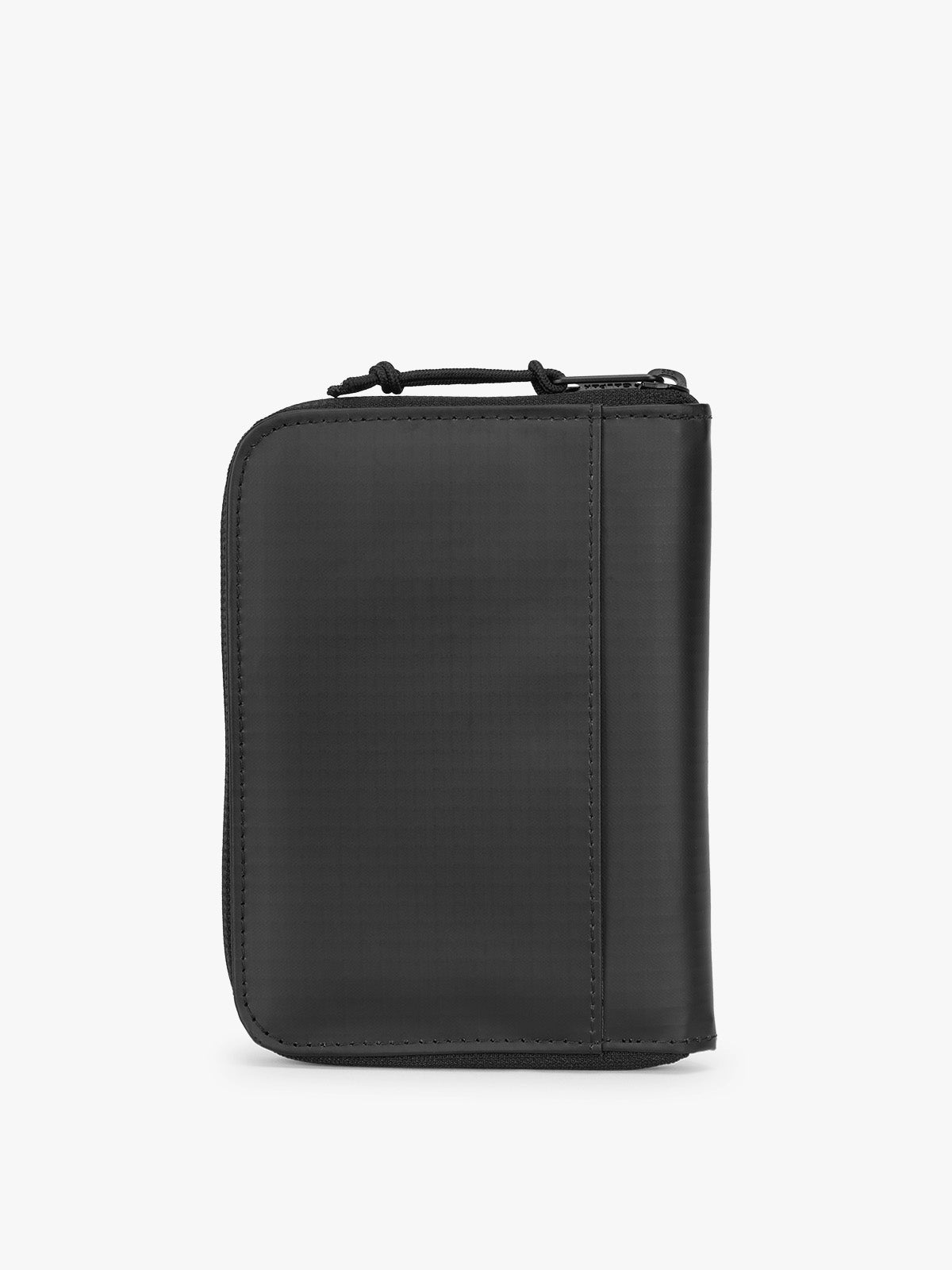 CALPAK Terra Zippered Passport Wallet in black Matte Obsidian back view; ATPW2501-MATTE-OBSIDIAN
