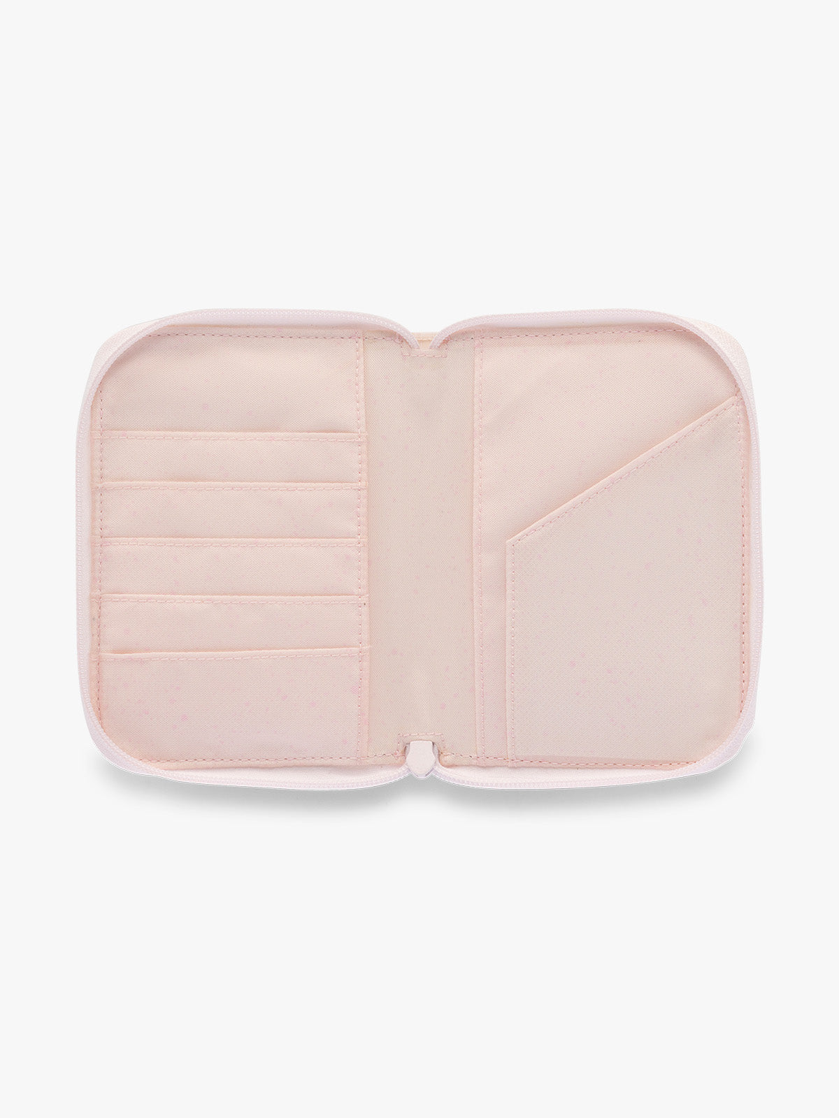 Opened CALPAK Terra Zip Passport Wallet in light pink Shell Pink; ATPW2501-SHELL-PINK