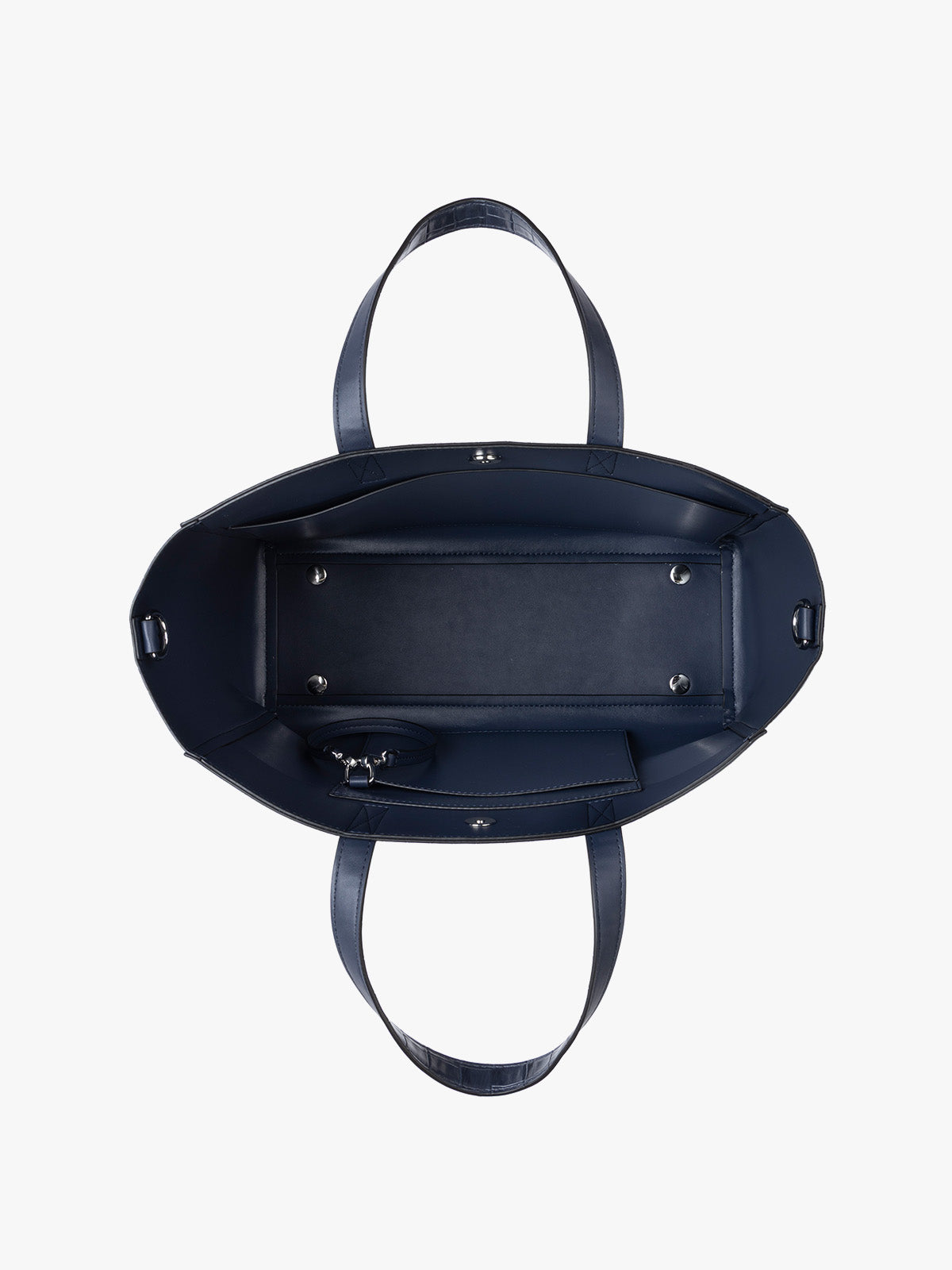 Top down view of a navy CALPAK Haven 15" Laptop Tote in Navy blue crocodile-embossed with dual top handles and a matching shoulder strap against a plain white background; ATS2501-NAVY-FAUX-CROC