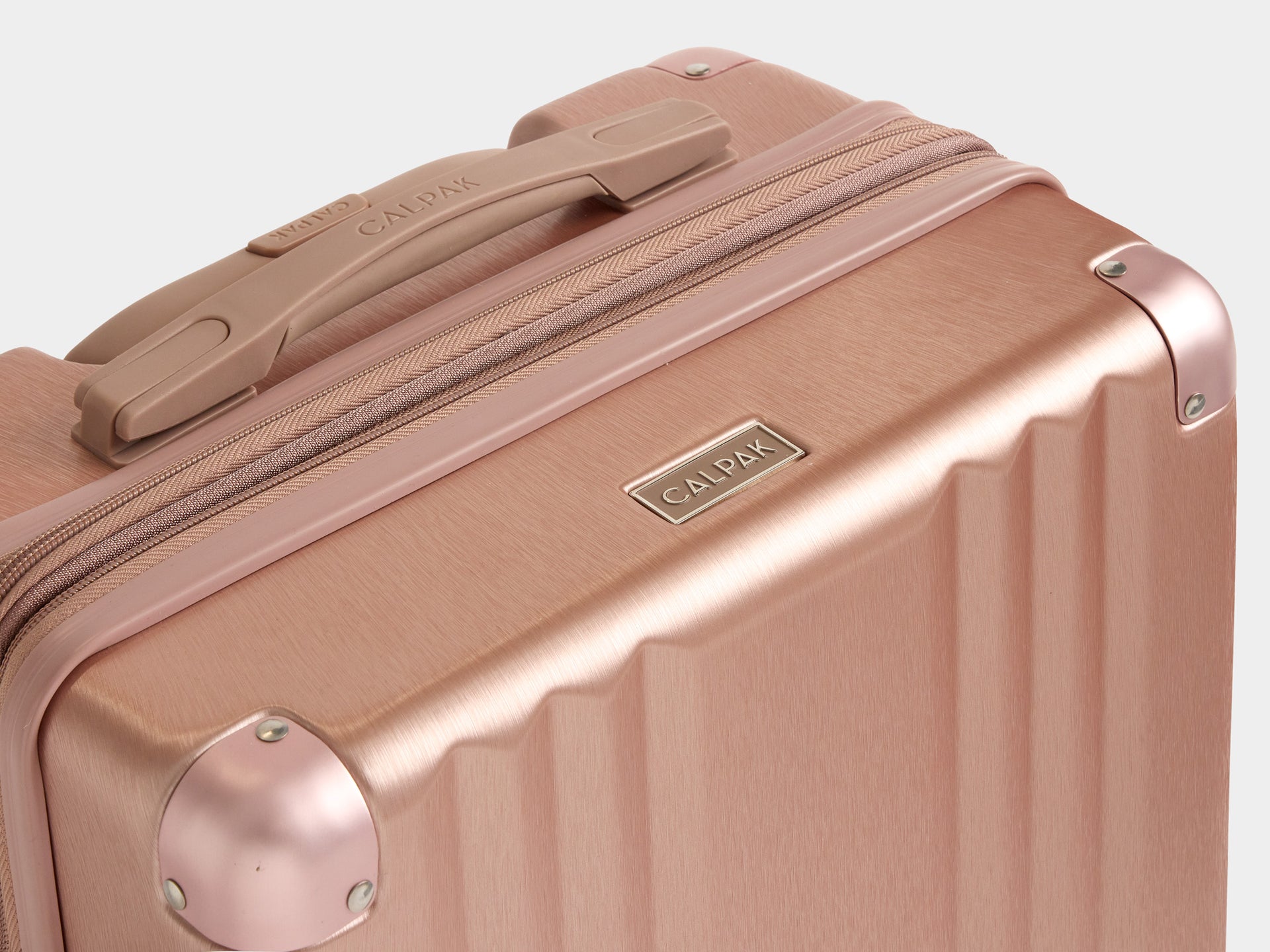CALPAK Ambeur Luggage in Rose Gold exterior shot