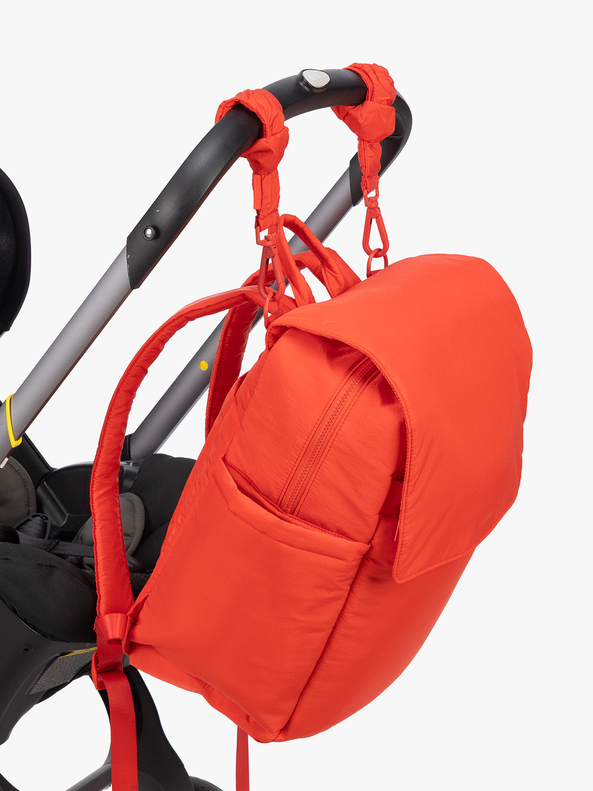 CALPAK Diaper Backpack in red Tomato strapped on stroller; BPB2401-TOMATO