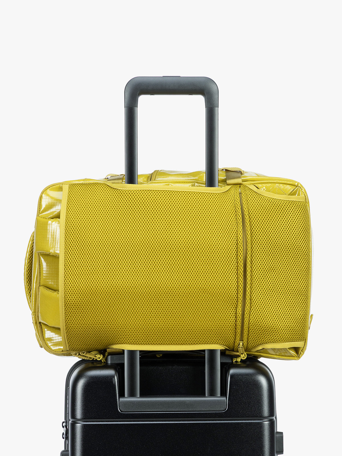 Backside trolley sleeve of CALPAK Terra 26L Laptop Backpack in yellow green Wasabi with multiple pockets on a white background; BPH2201-WASABI