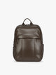 CALPAK Mushroom brown Luka 15 inch Laptop Backpack in vegan leather with a glossy finish, featuring a top carry handle, a main zippered compartment, and a front slip pocket, shown against a plain white background; BPL2001-MUSHROOM-PU