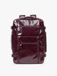 CALPAK Terra 35L Laptop Backpack Duffel in dark red Dark Cherry with tan accents on a white background; BPTL2601-DARK-CHERRY