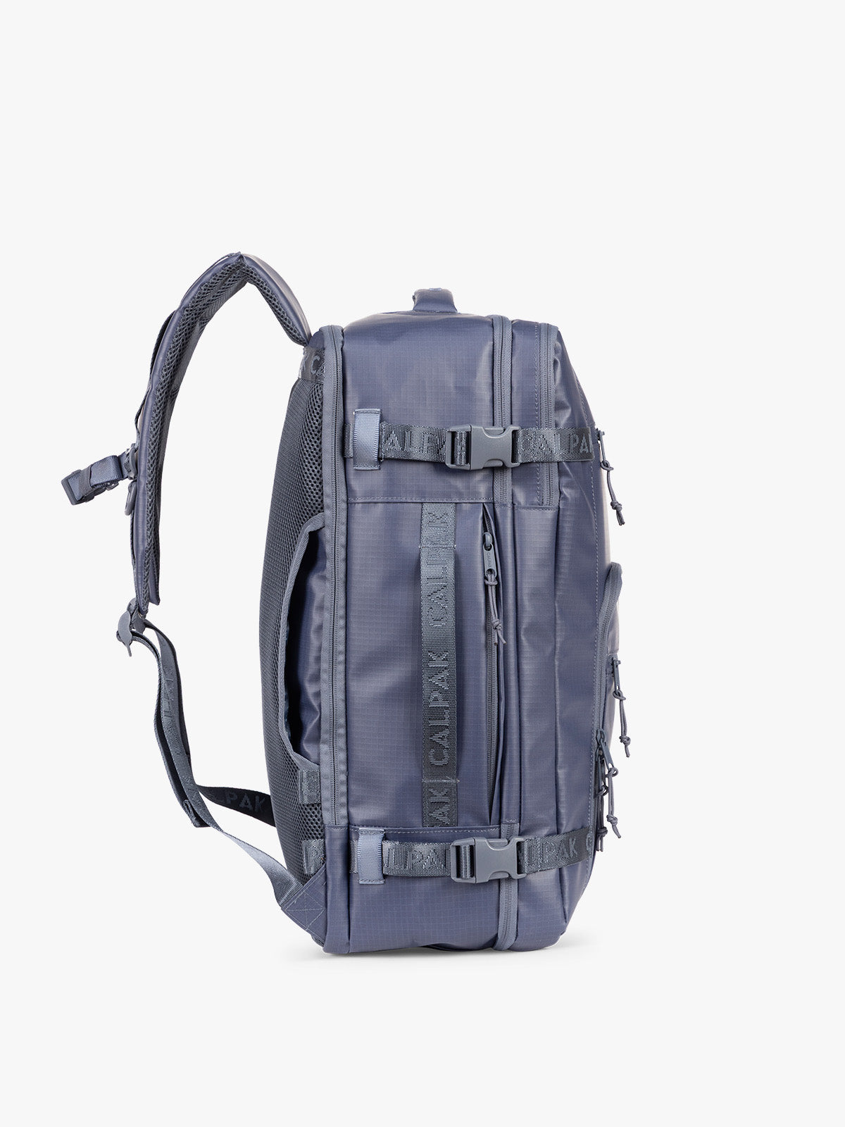 Side view CALPAK Terra 35L Laptop Backpack Duffel in matte dark blue Indigo with tan accents on a white background; BPTL2601-INDIGO