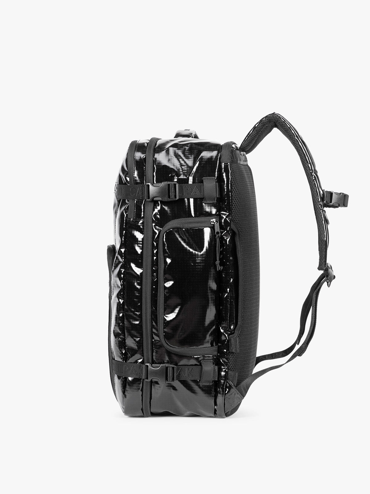 Side view of  the CALPAK Terra 35L Laptop Duffel Backpack in shiny black Obsidian on a white background; BPTL2601-OBSIDIAN