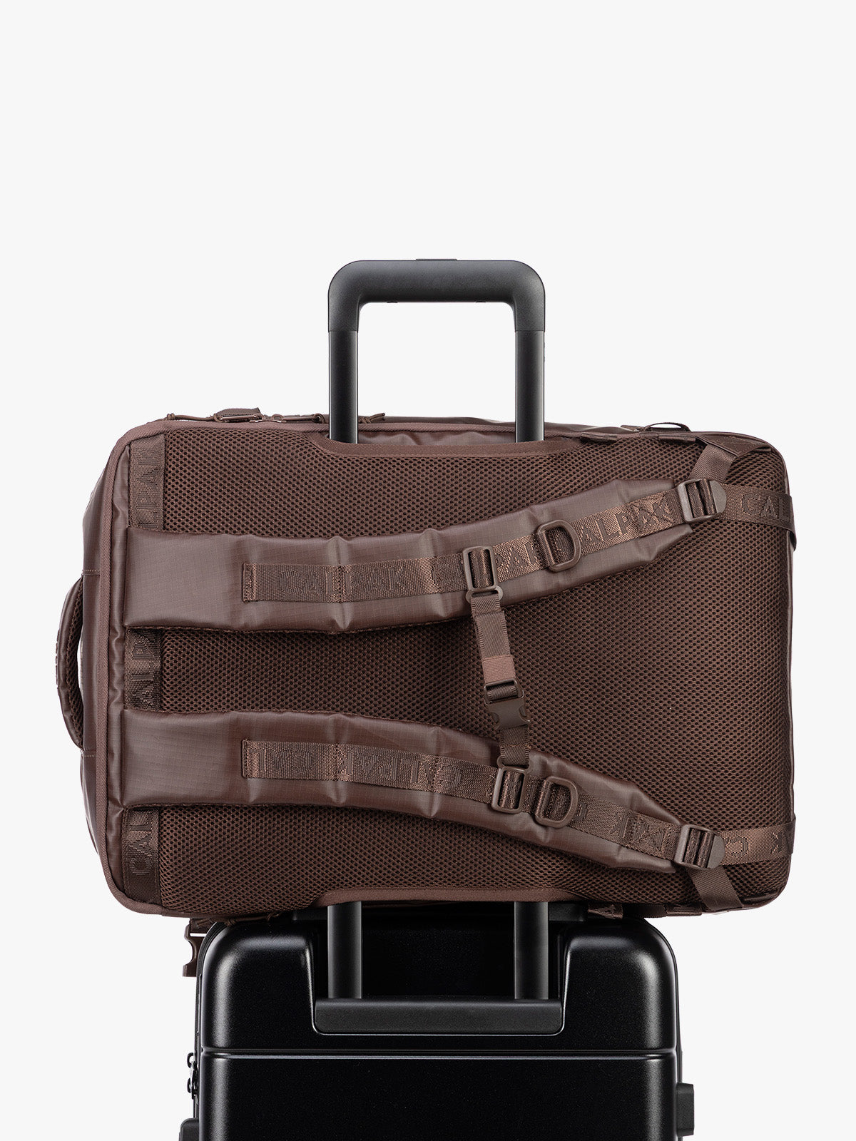 Back trolley sleeve of CALPAK Terra 35L Laptop Backpack Duffel in matte brown Walnut on a white background; BPTL2601-WALNUT