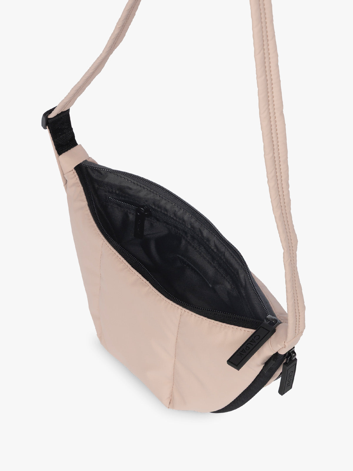 Opened CALPAK Luka Crescent Bag in light pink Rose Quartz; CBL2601-ROSE-QUARTZ