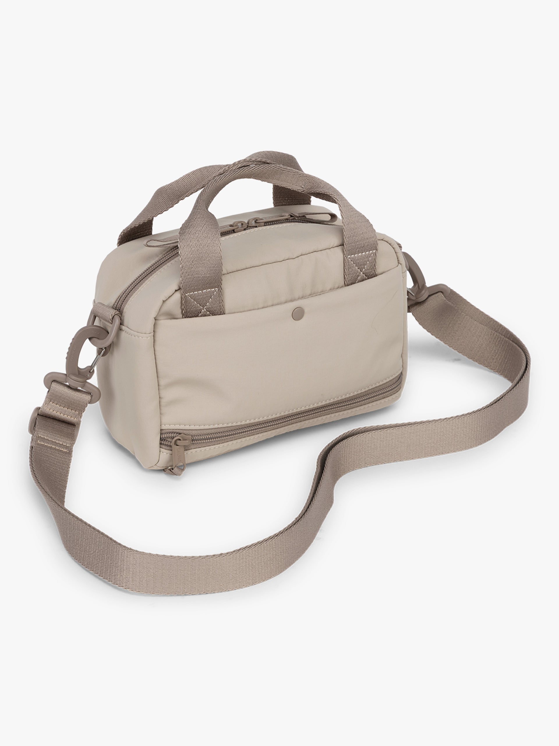 CALPAK Connect Crossbody Bag in beige color Greige with a shoulder strap on a white background; CCN2501-GREIGE