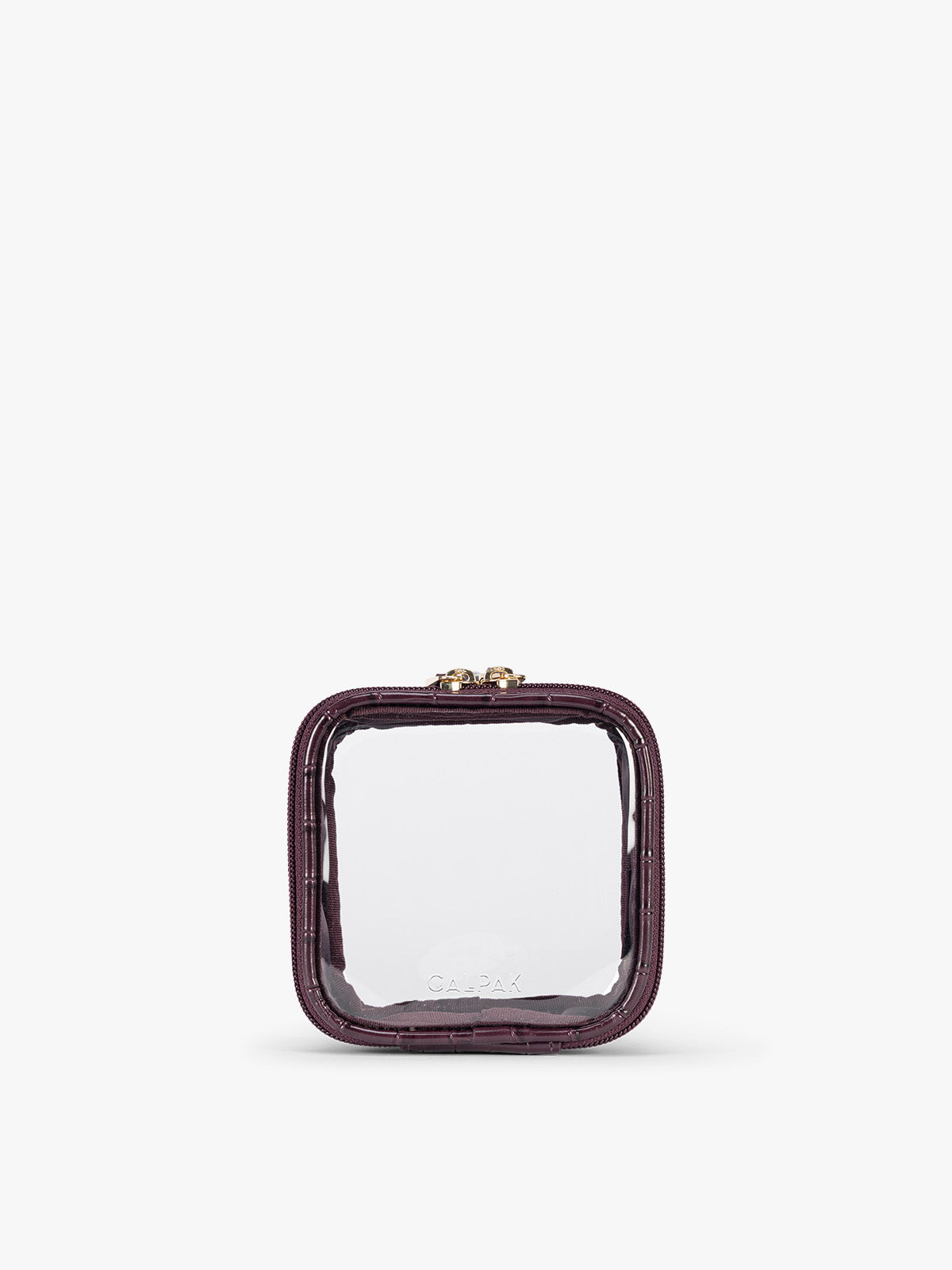 CALPAK Tiny Clear Cosmetics Case that is a transparent pouch with a deep red Dark Cherry in crocodile-embossed; CCT2501-DARK-CHERRY-FAUX-CROC