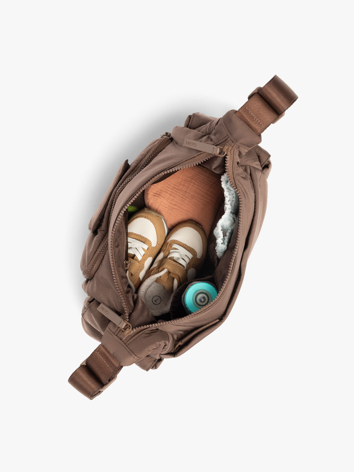 CALPAK Crossbody Diaper Bag in brown Hazelnut top view with zipper opened, showing interior of bag; CDB2501-HAZELNUT